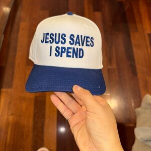 White and Blue Trucker Hat with 'JESUS SAVES I SPEND' Embroidery